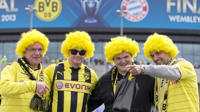 Borussia Dortmund fans sport their team's colours outside Wembley Stadium before the UEFA Champions League final against FC Bayern München