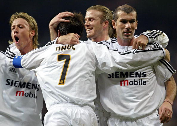French Zinedine Zidane (R), British midfielder David Beckham (2R), Raul Gonzalez (7) and Guti (L) celebrate after Raul scored the second goal during their Spanish King's Cup semi final