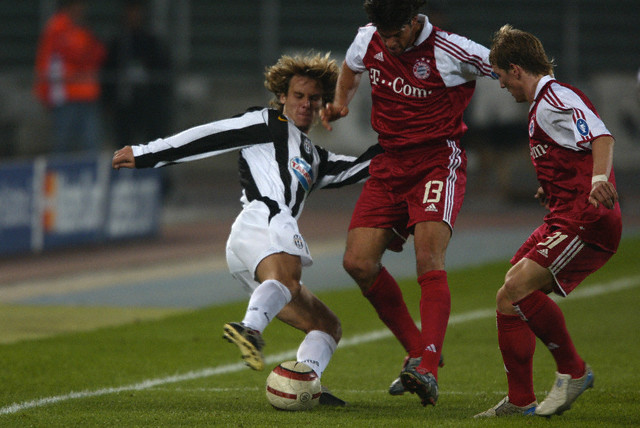 UEFA Champions League soccer, season 2004-2005. Juventus vs FC Bayern Munchen. Pavel Nedved (Juventus), Michael Ballack (Munchen) and Bastian Schweinsteiger (Munchen).