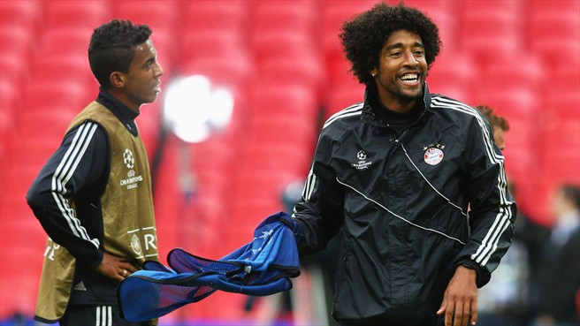 Dante of FC Bayern München (R) during a training session ahead of the UEFA Champions League final against Borussia Dortmund