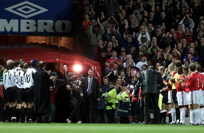 Ferguson is given a rapturous welcome as he walks out onto the pitch at Old Trafford before his testimonial, October 1999