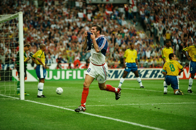 France's Zinedine Zidane celebrates scoring the second goal of the 1998 FIFA World Cup final against Brazil. France won 3-0.