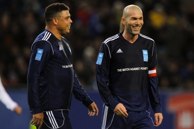 Ronaldo (L) and Zinedine Zidane of Team Ronaldo, Zidane and friends smile during the charity soccer match 2011