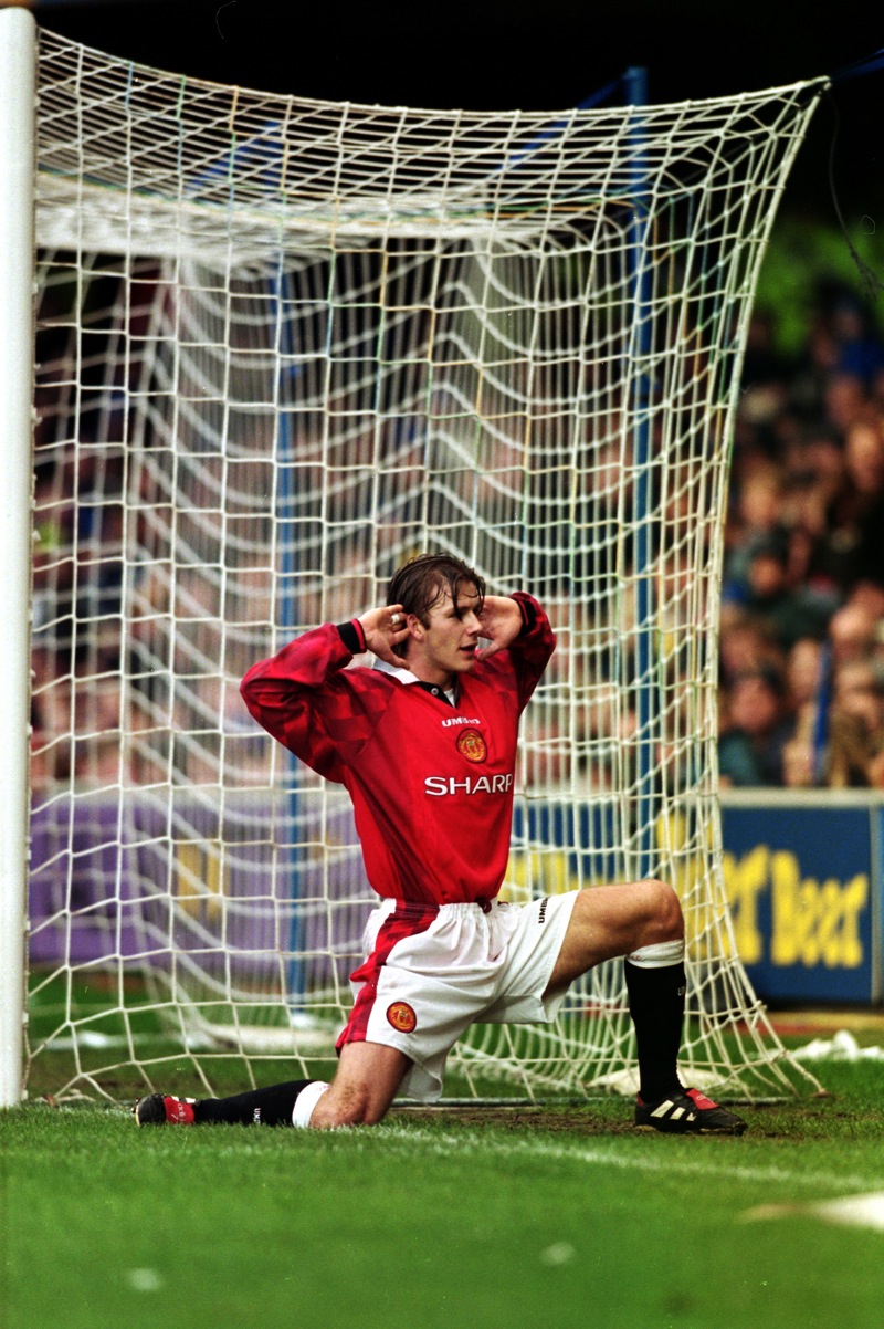 Striking a pose after putting United in the lead against Chelsea in the FA Cup in January 1998