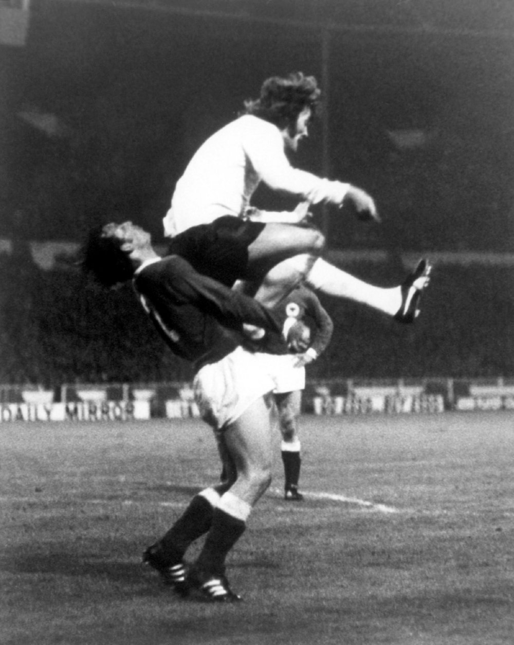West Germany’s Horst-Dieter Hottges gets a face full of Rodney Marsh’s backside during the European Championship quarter-final, 1972