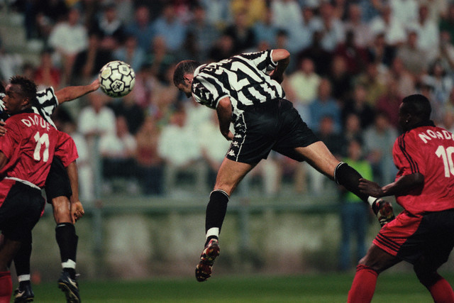 Zinedine Zidane heads the ball during an Intertoto match between Juventus and Rennes. 1999