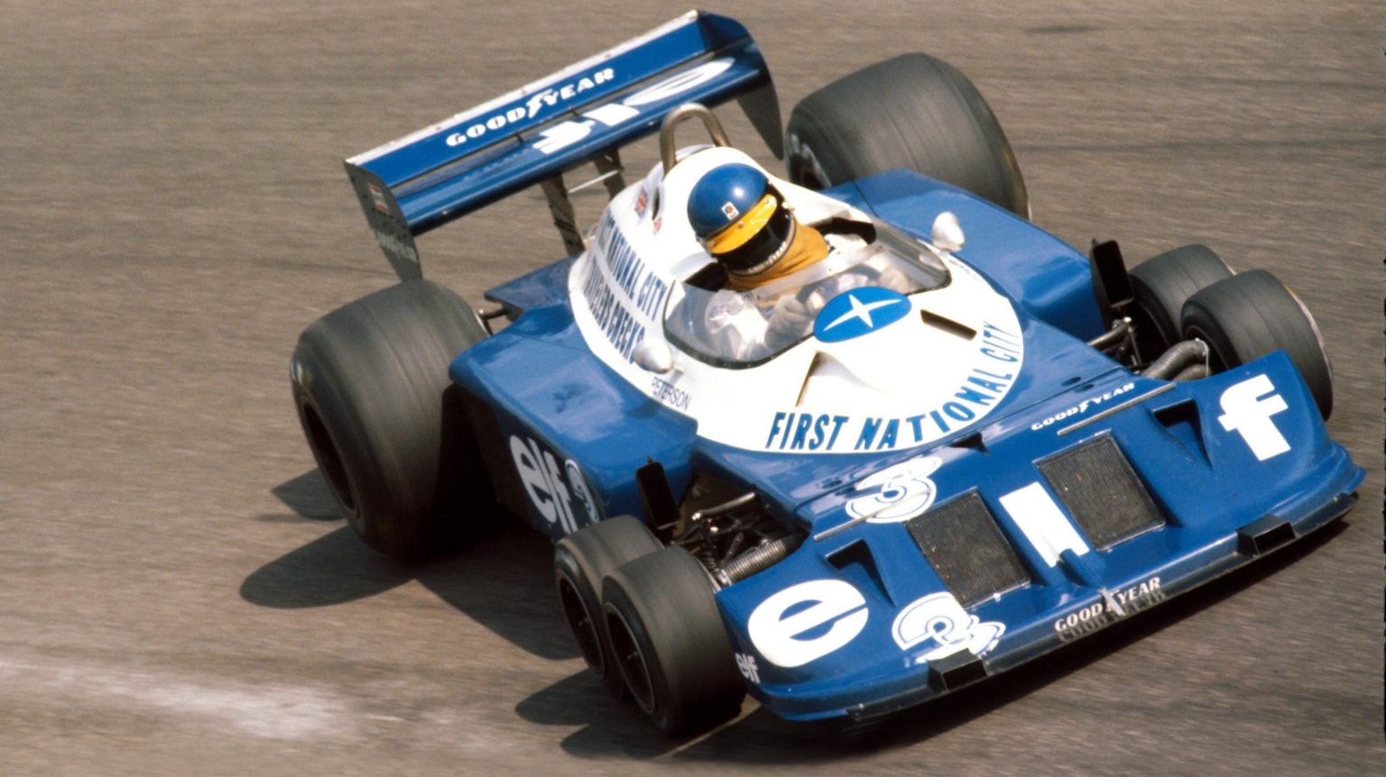 1 6 cars. F1 Tyrrell p34 Racing 1977. Tyrrell p34 1/10. Tyrrell p34 Six-Wheeler Race car. Tyrrell f1 Team Truck 1977.