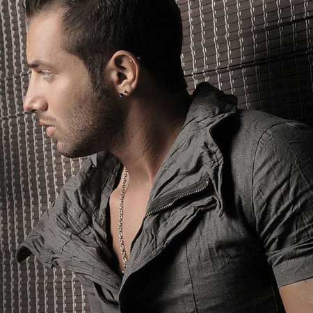http://up.actmusic.ir/92/bahman/Amir%20Tataloo%20-%20Bikhiyal.mp3